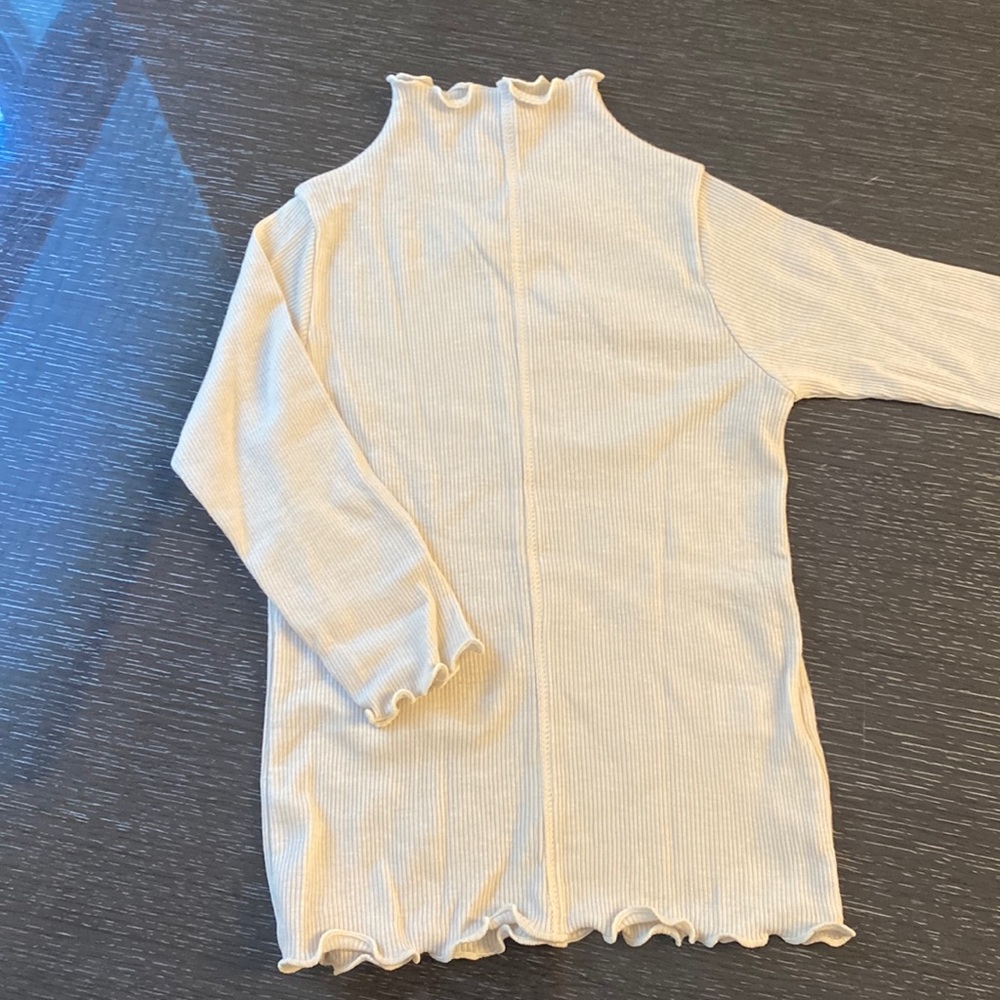 Baby girl cream turtleneck